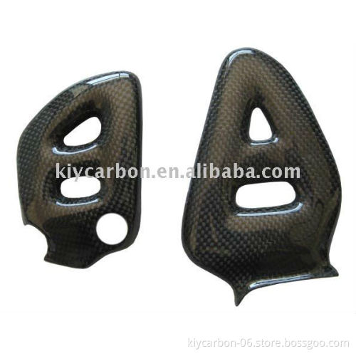 Carbon fiber motorcycle heel plates